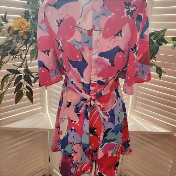 92 Umgee Floral Print Short Bell Sleeve V-Neck Romper with a Waist Tie - Picture 5 of 6